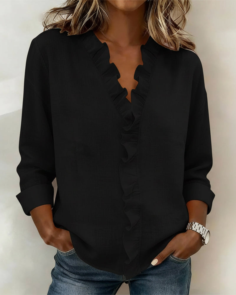 Rynket bluse med V-hals