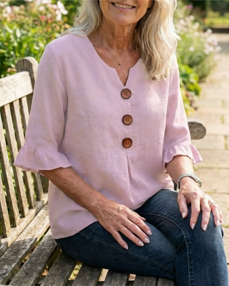 Blusa liscia in cotone e lino con bottoni in legno e volant