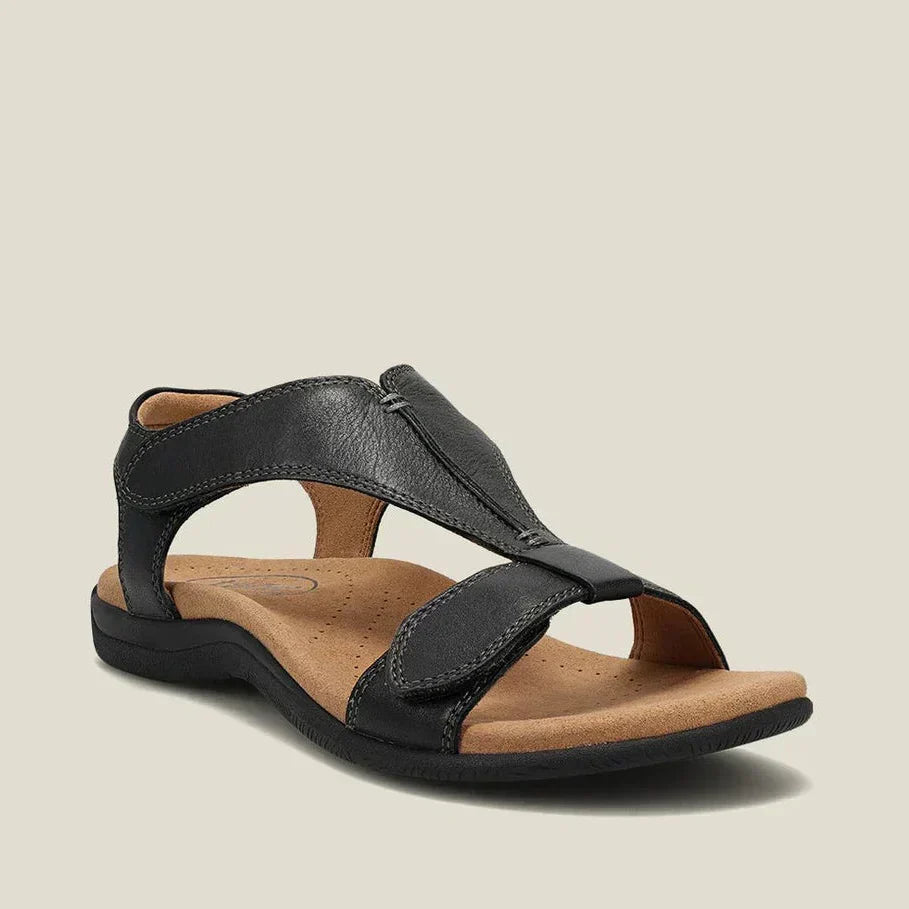 Flate sandaler med midtstøttestripe og justerbar hælrem
