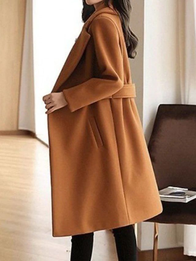 Manteau long à boutons latéraux