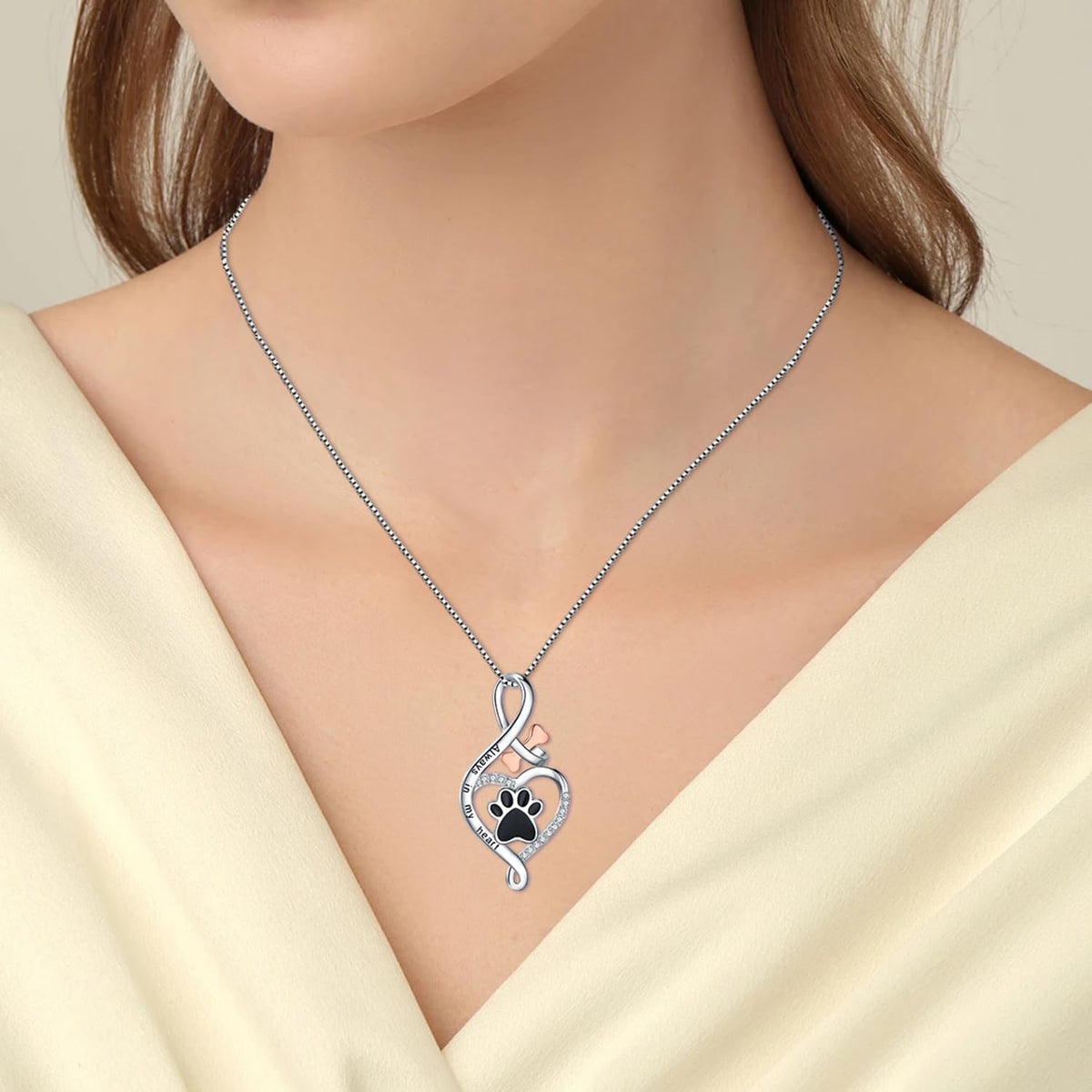 Collier patte avec cœur, os et infini