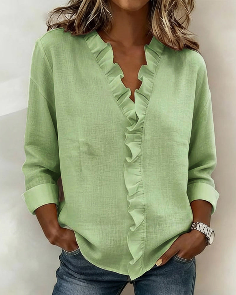 Rynket bluse med V-hals