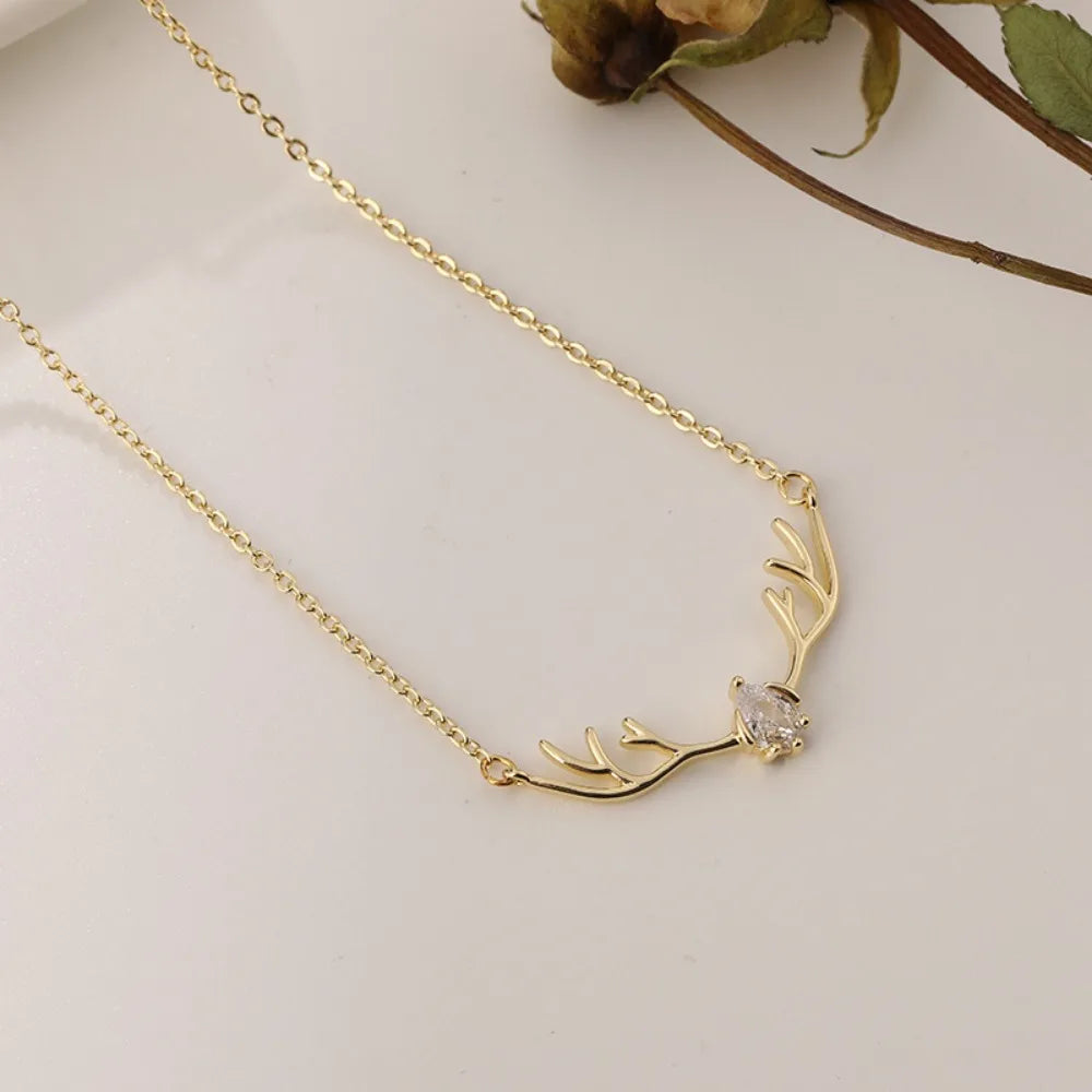 Collier en bois de cerf avec cœur