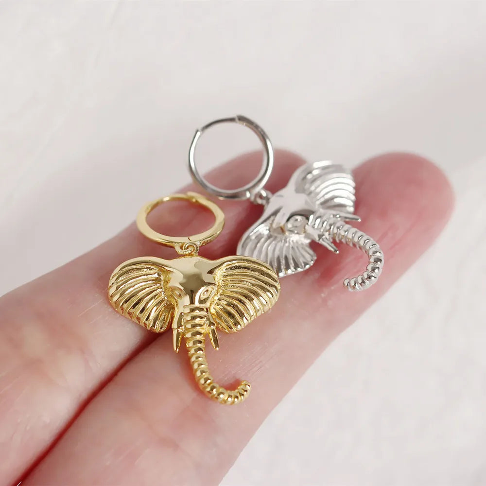 Boucles d'oreilles créoles avec éléphant