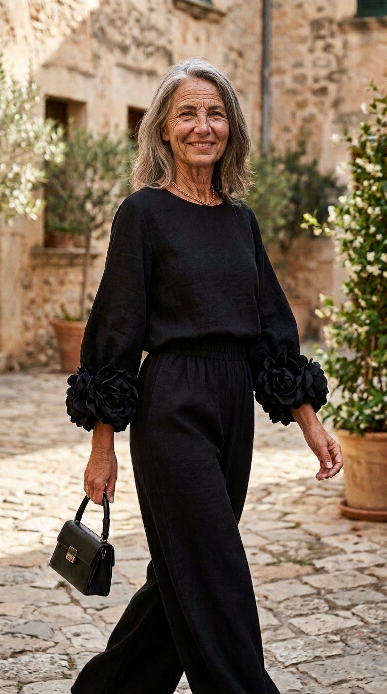 Conjunt de top amb punys florals i pantalons de cama ampla