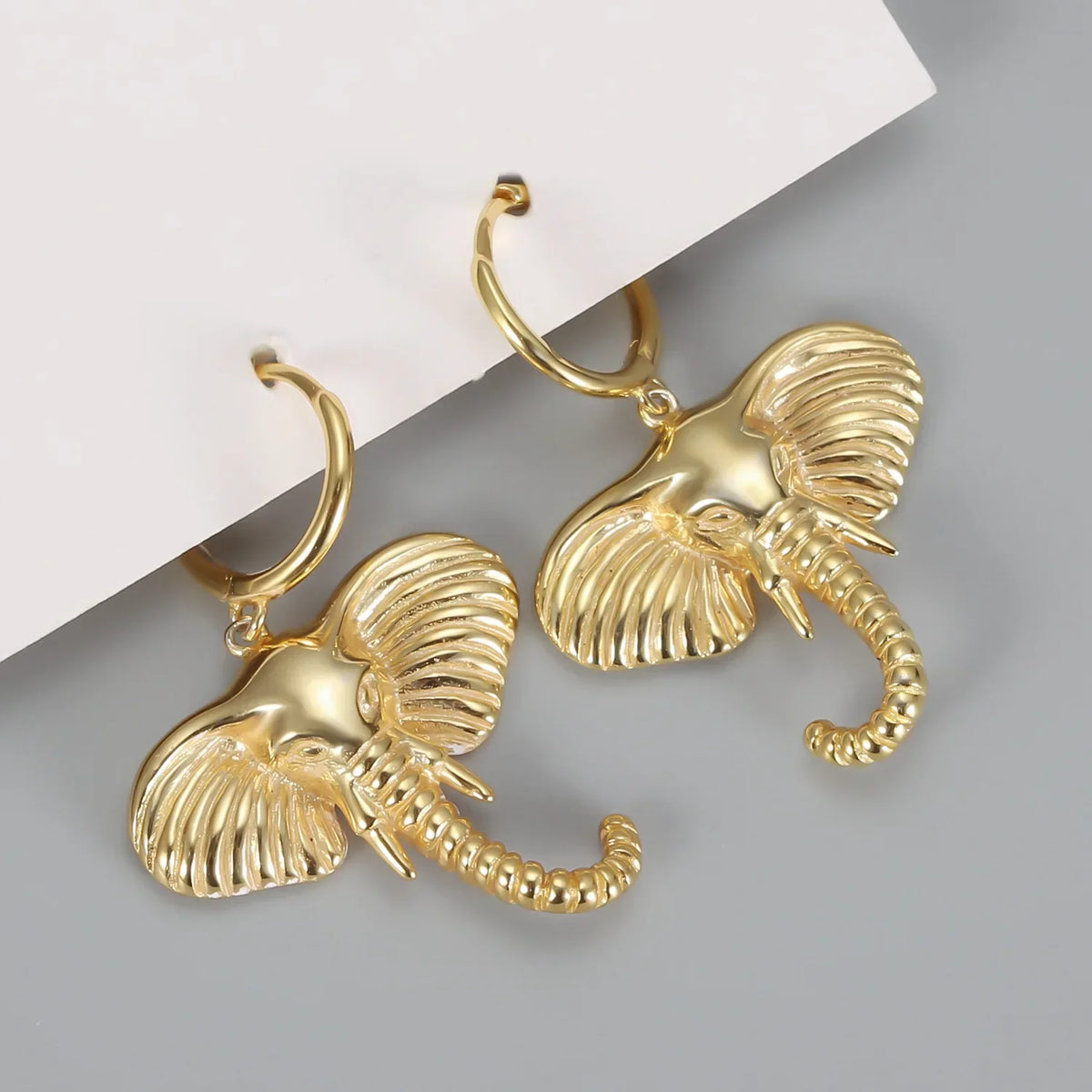 Boucles d'oreilles créoles avec éléphant