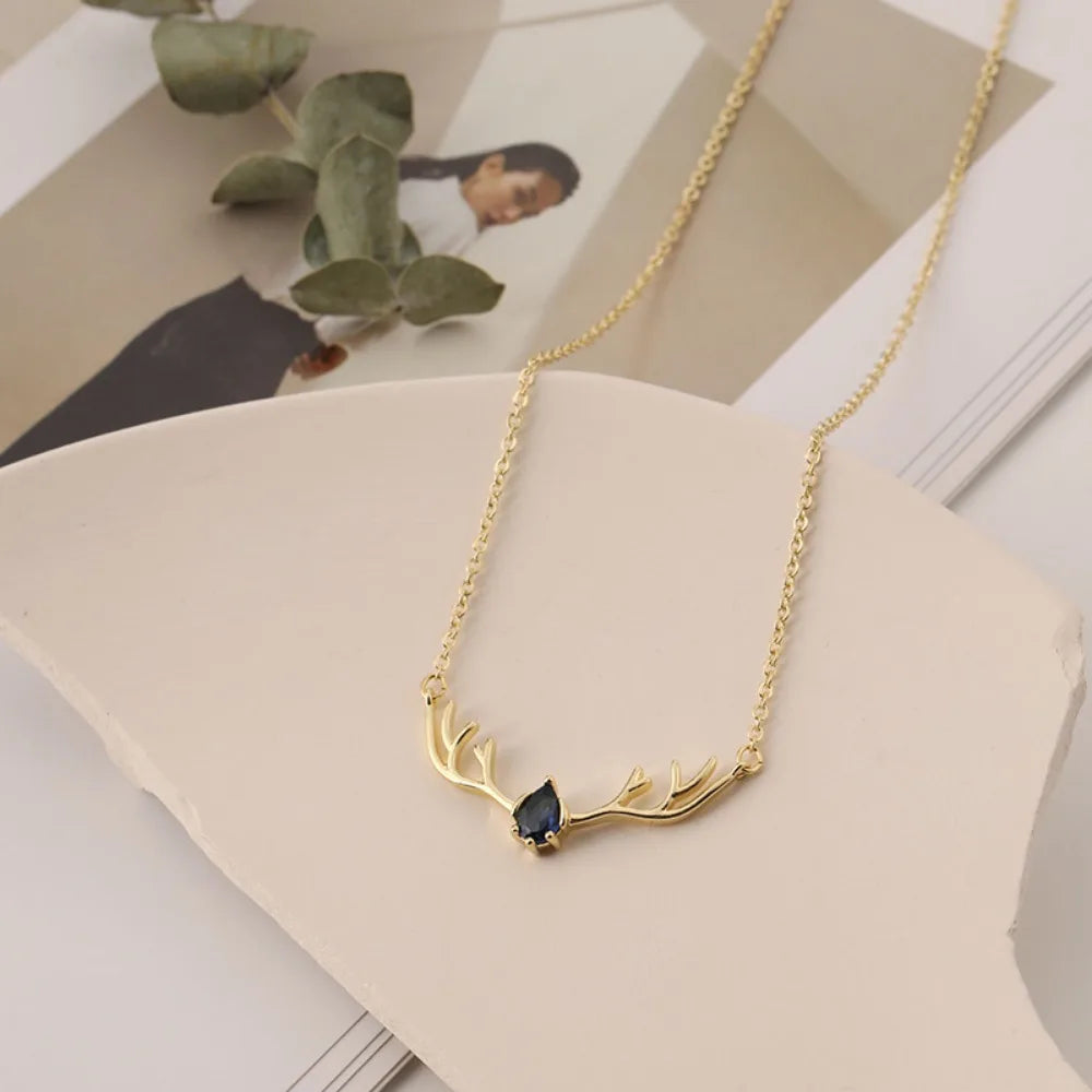 Collier en bois de cerf avec cœur