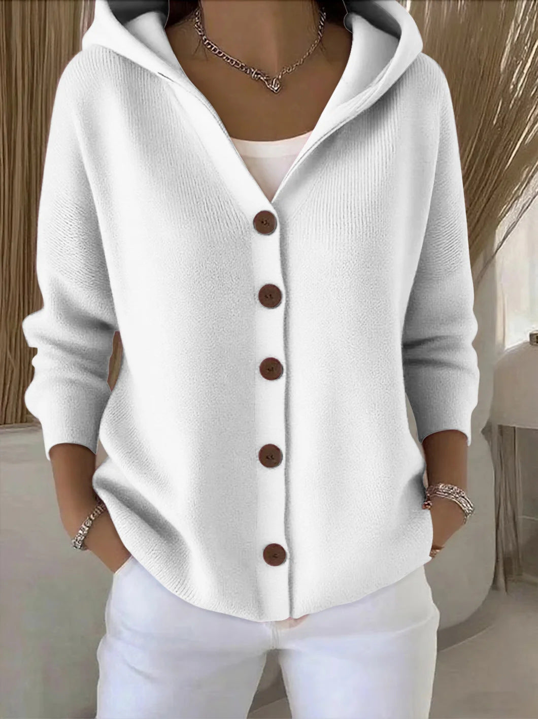 Veste en tricot avec capuche