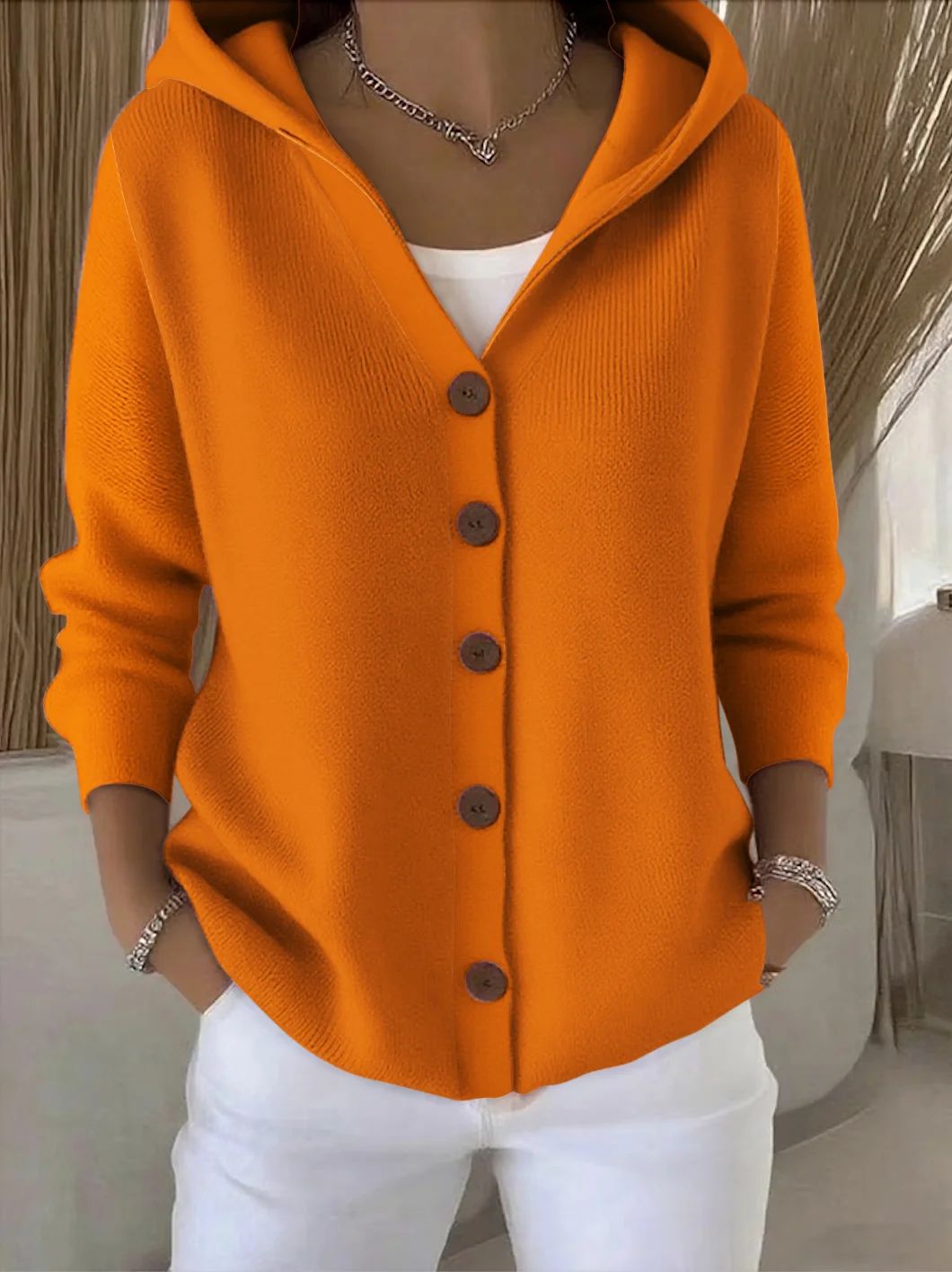 Veste en tricot avec capuche