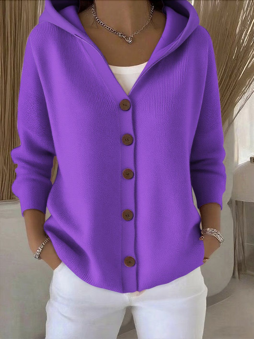 Veste en tricot avec capuche
