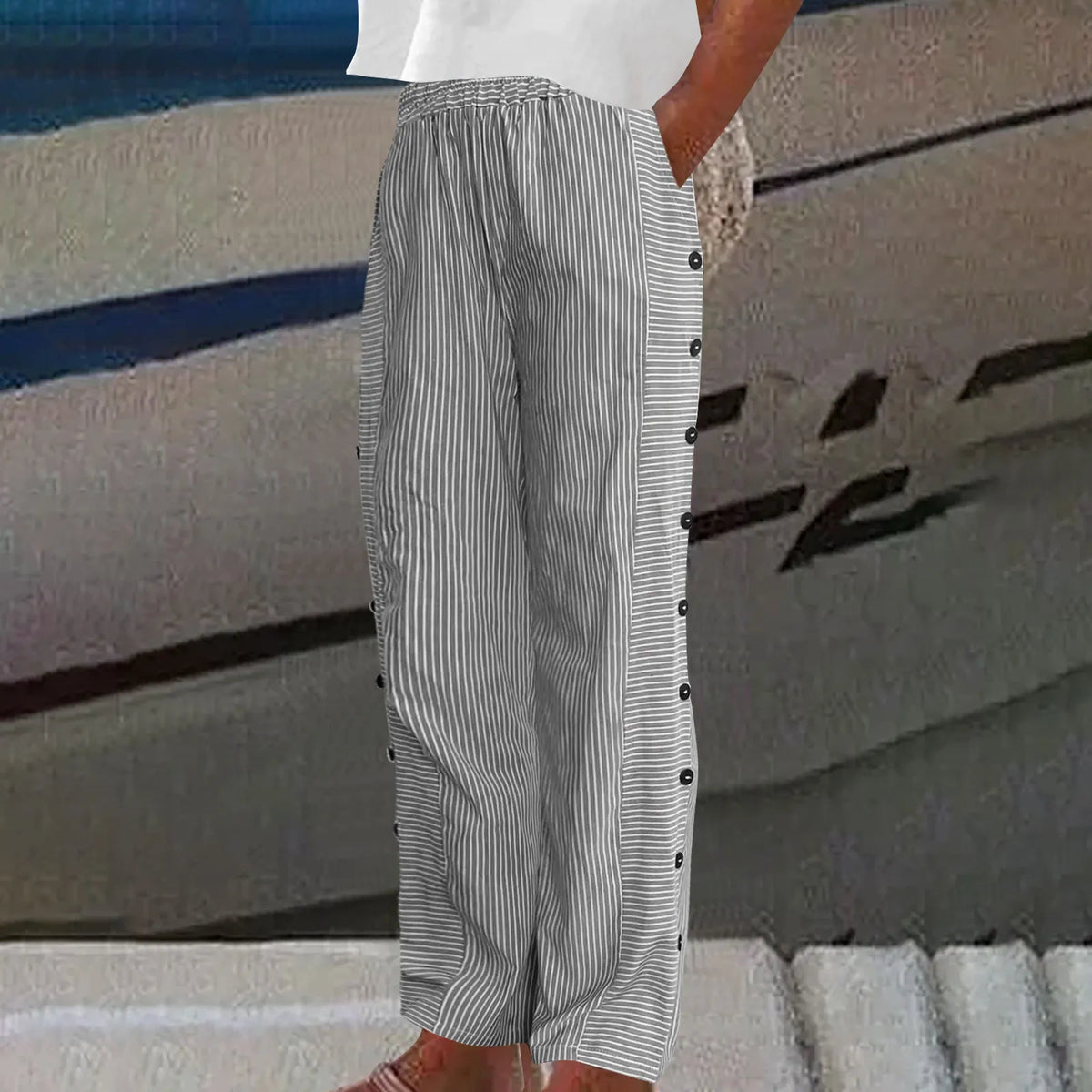 Pantaloni a righe con bottoni