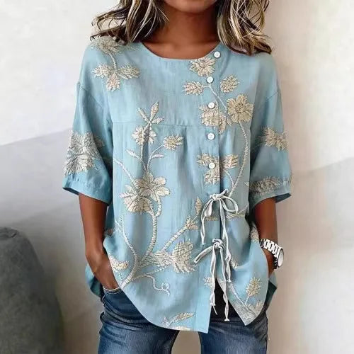 Blusa floreale elegante
