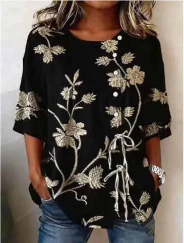 Elegant blomstrete bluse