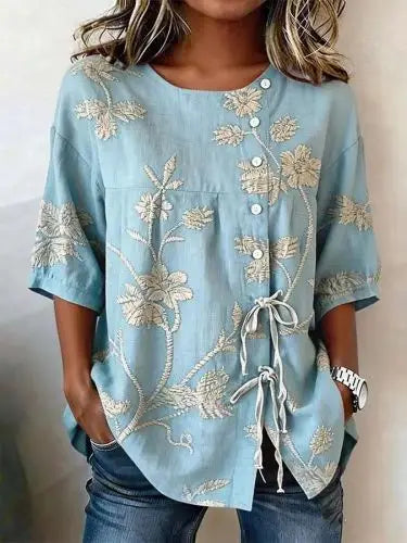 Elegant blomstrete bluse