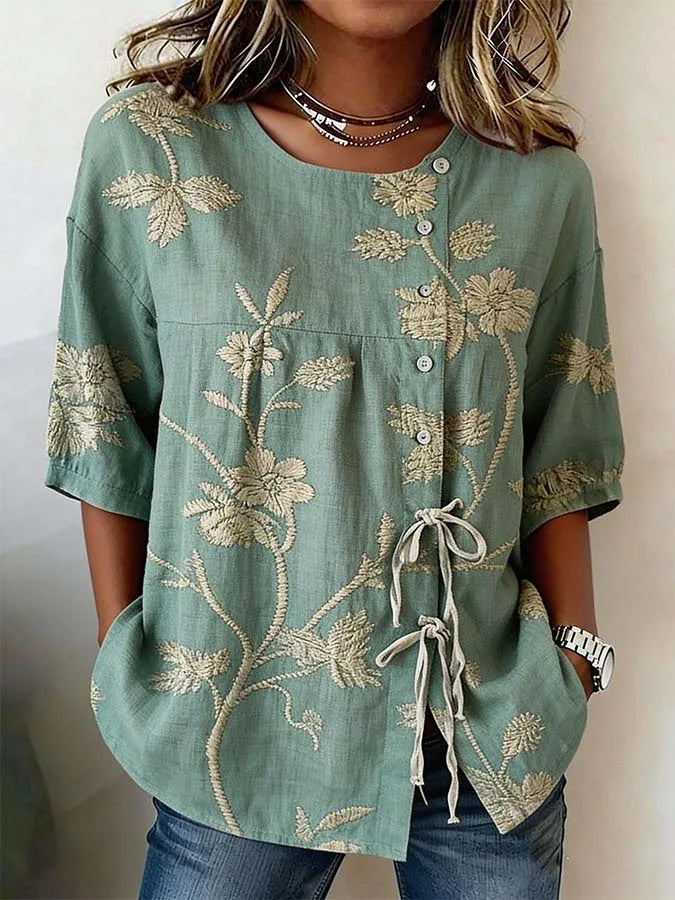 Elegant blomstrete bluse