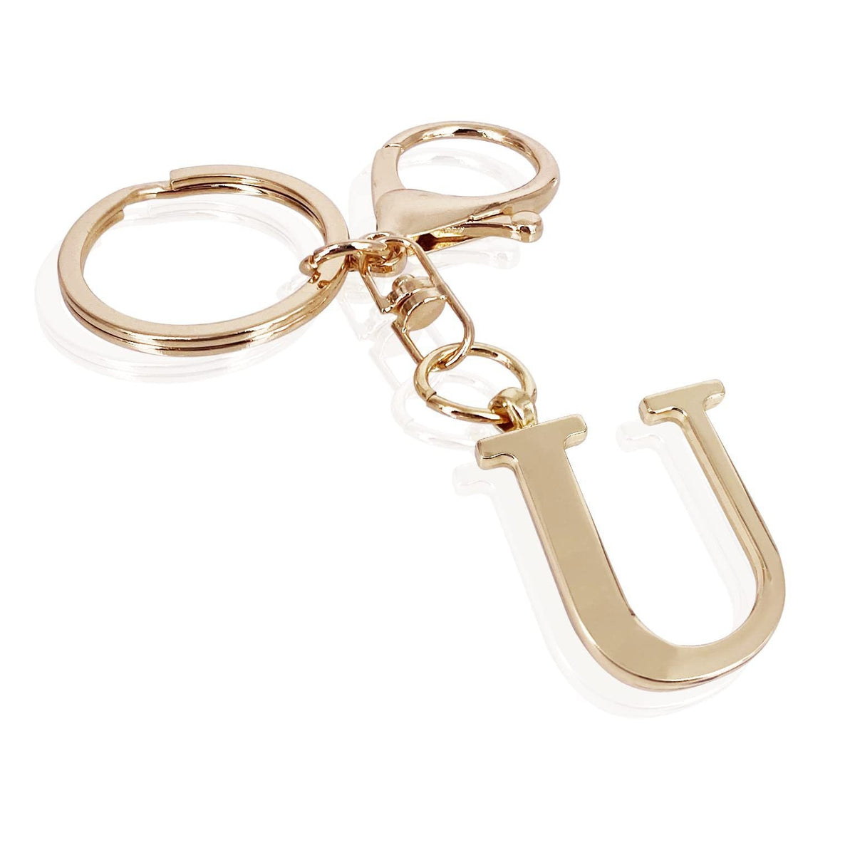 INITIAL | Encant d'una bossa elegant amb aspecte daurat