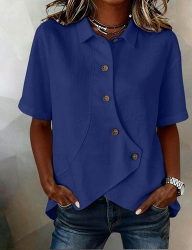 Asymmetrisk bluse i bomull og lin med knapper
