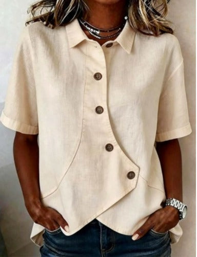 Asymmetrisk bluse i bomull og lin med knapper