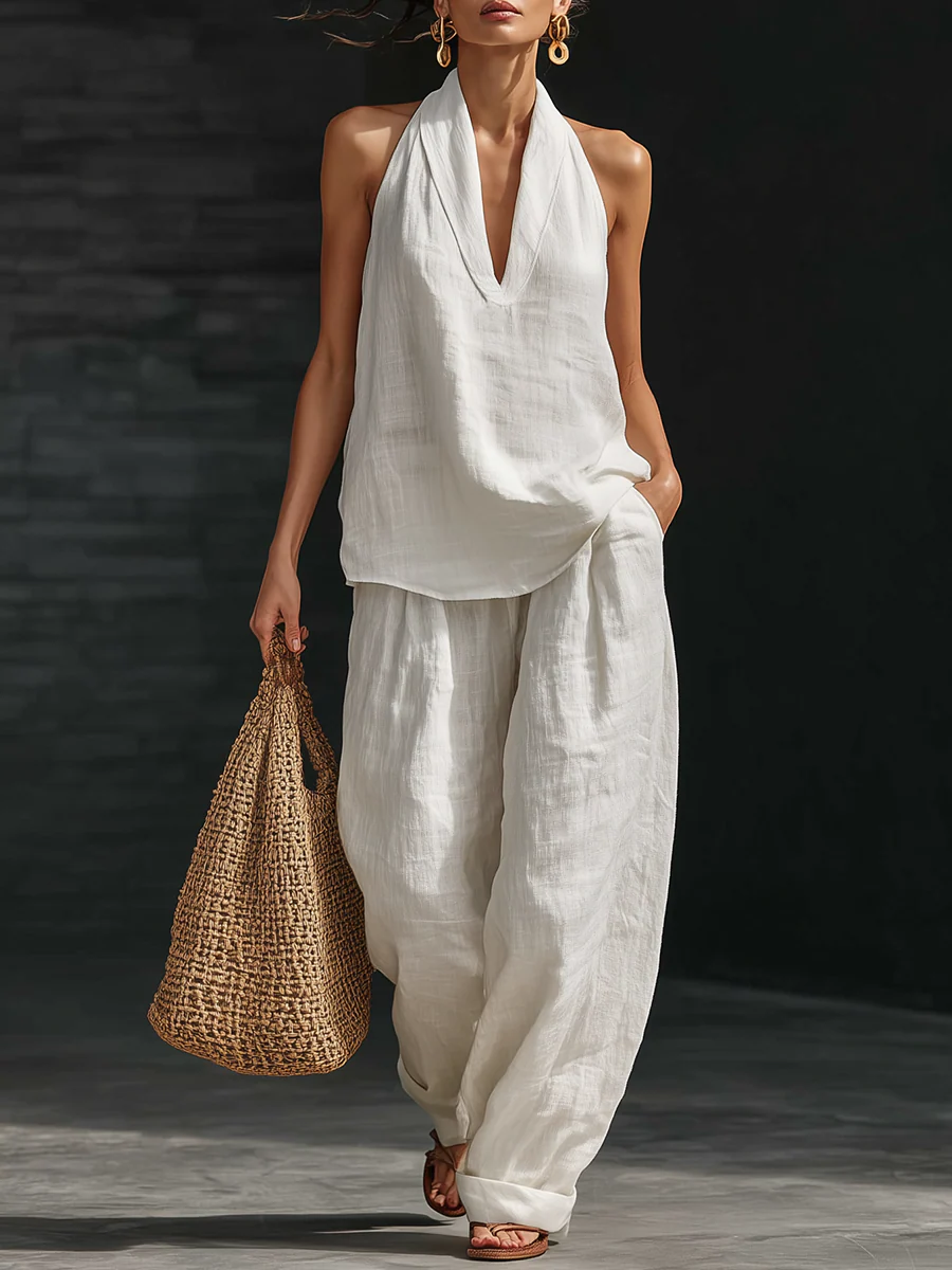 Completo elegante senza maniche con pantaloni a gamba larga