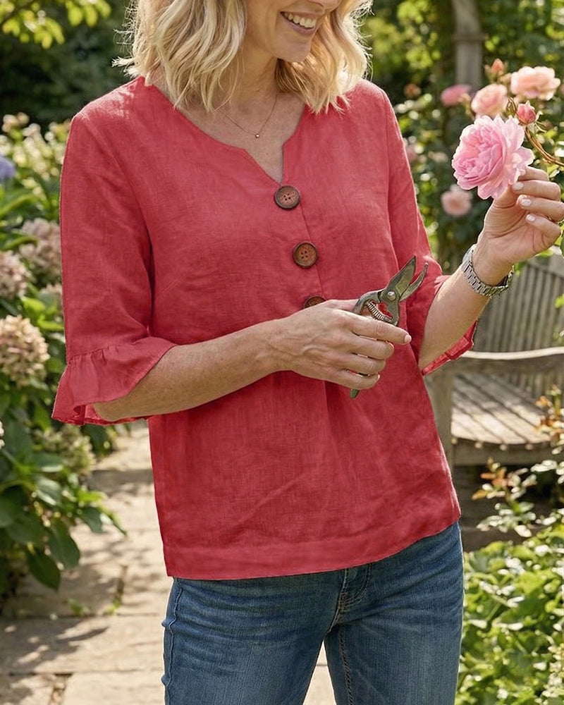 Blusa liscia in cotone e lino con bottoni in legno e volant