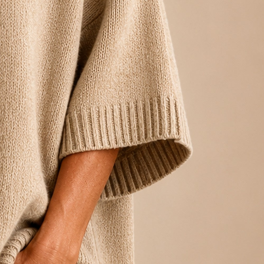 Poncho con capucha y mangas 3/4