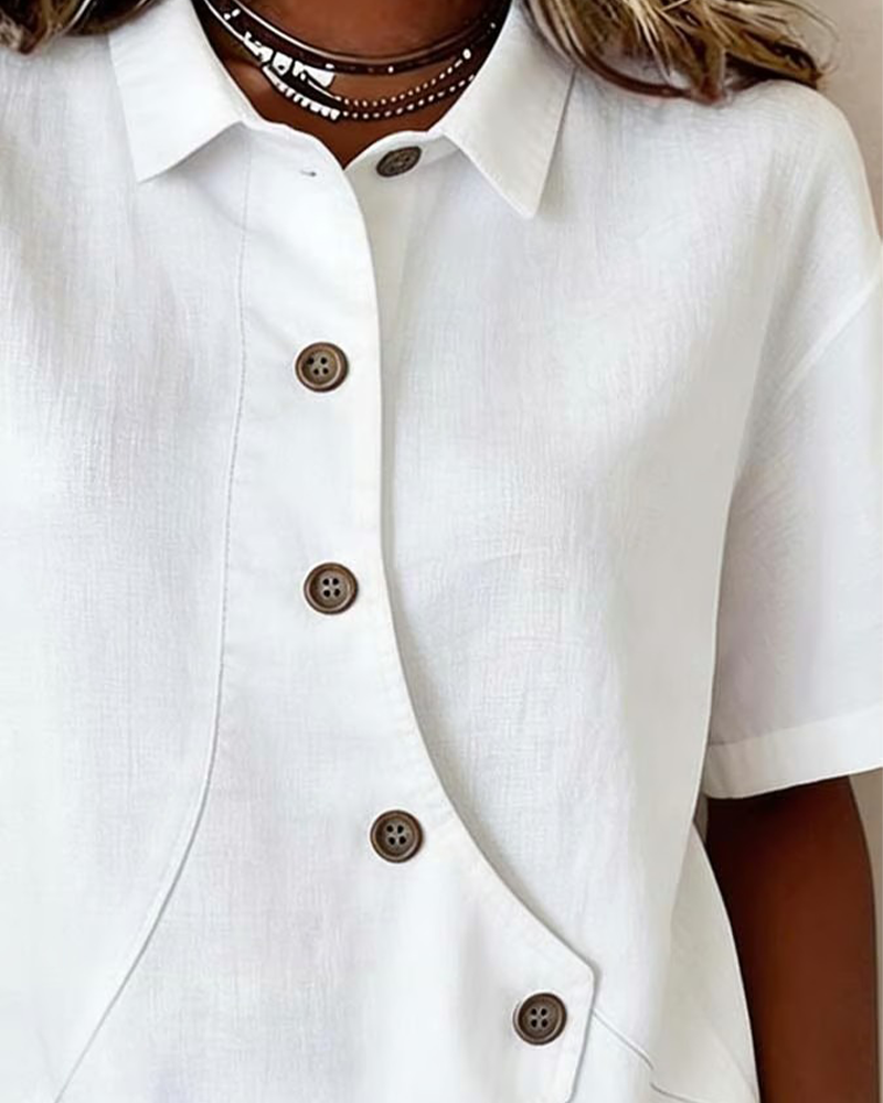 Blusa asimmetrica in cotone e lino con bottoni