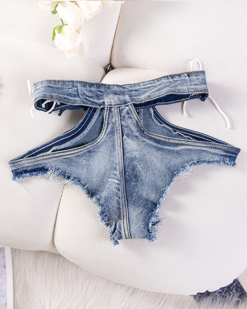 Tanga sexy de tela denesa de tall tancat amb buits i vores encantellades