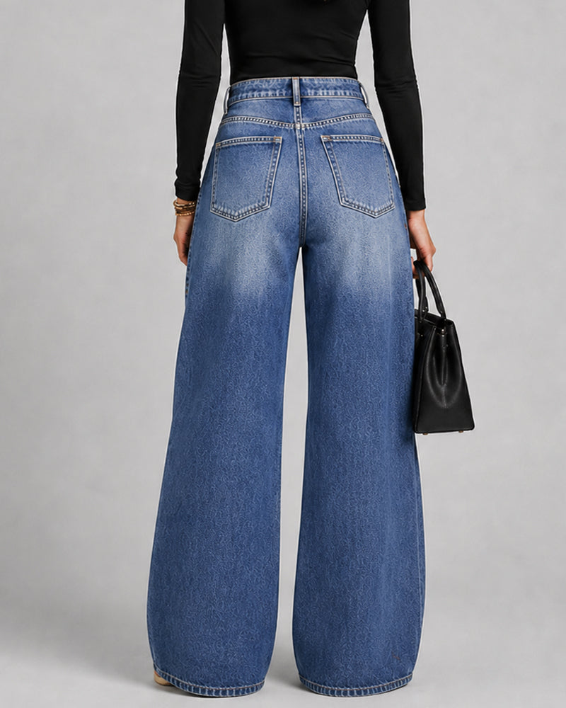 Jean large taille haute délavé à œillets métalliques