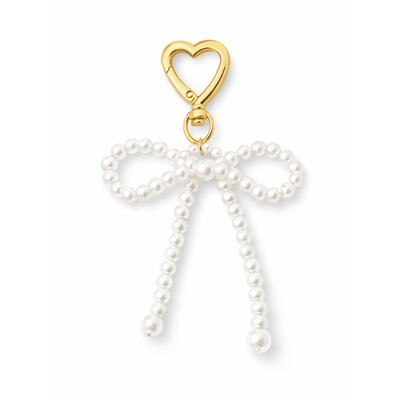 PEARL BOW | Bijou de sac élégant aspect doré
