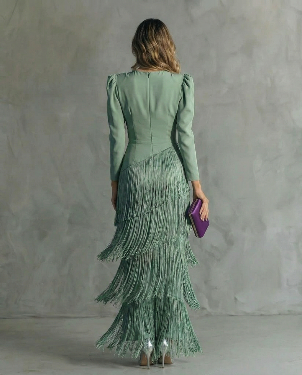 Abito elegante con maniche di frange