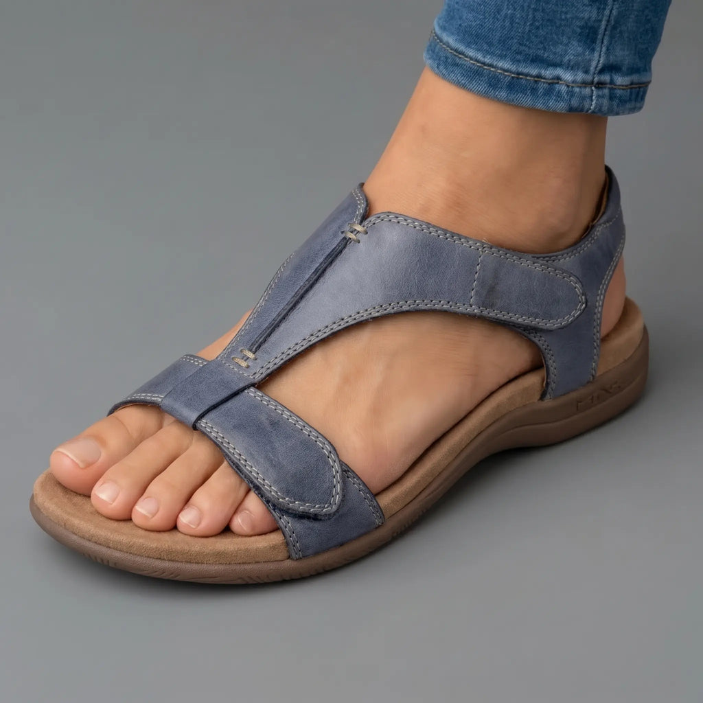 Flate sandaler med midtstøttestripe og justerbar hælrem