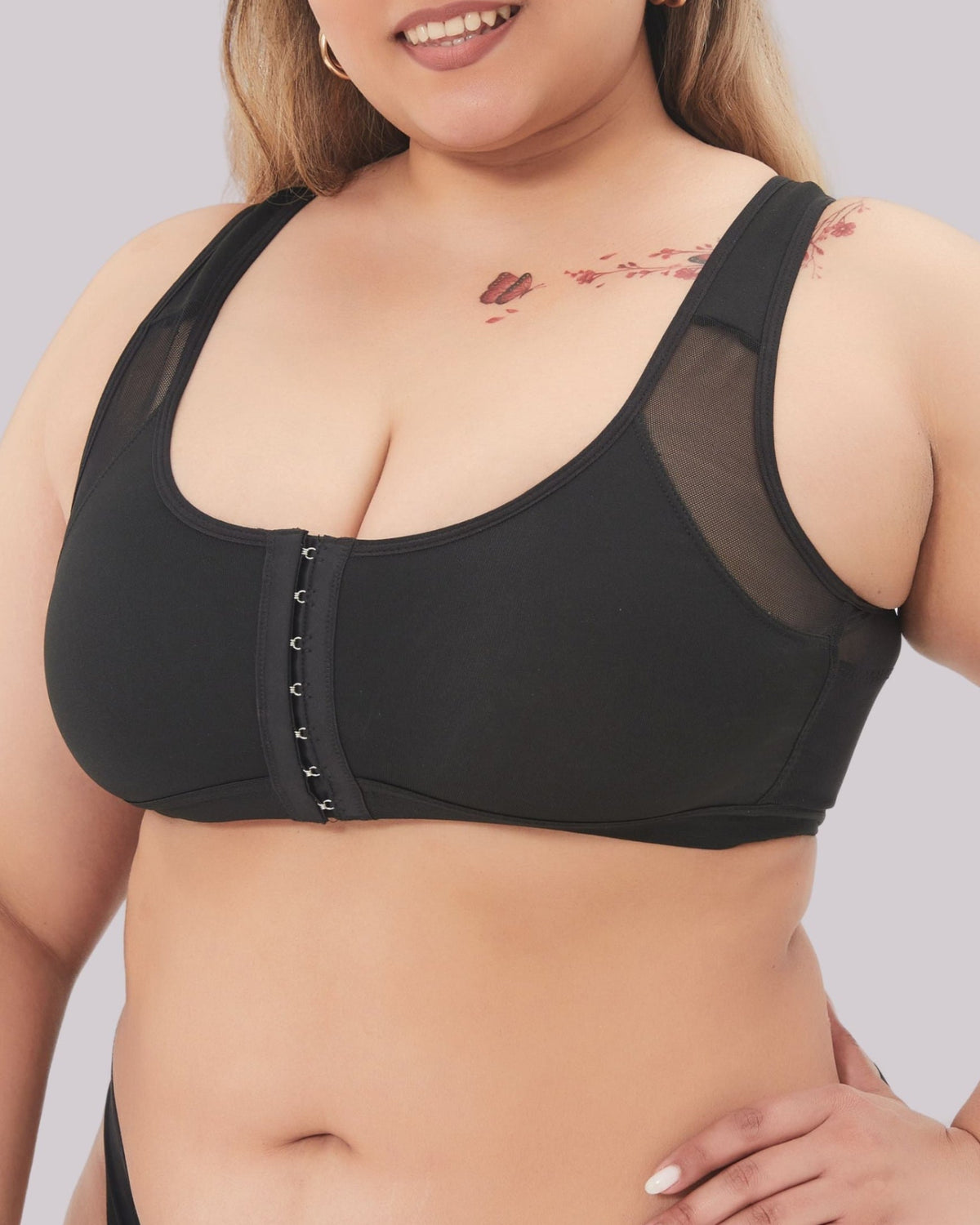 Reggiseno sollevante anti-slogamento con chiusura frontale