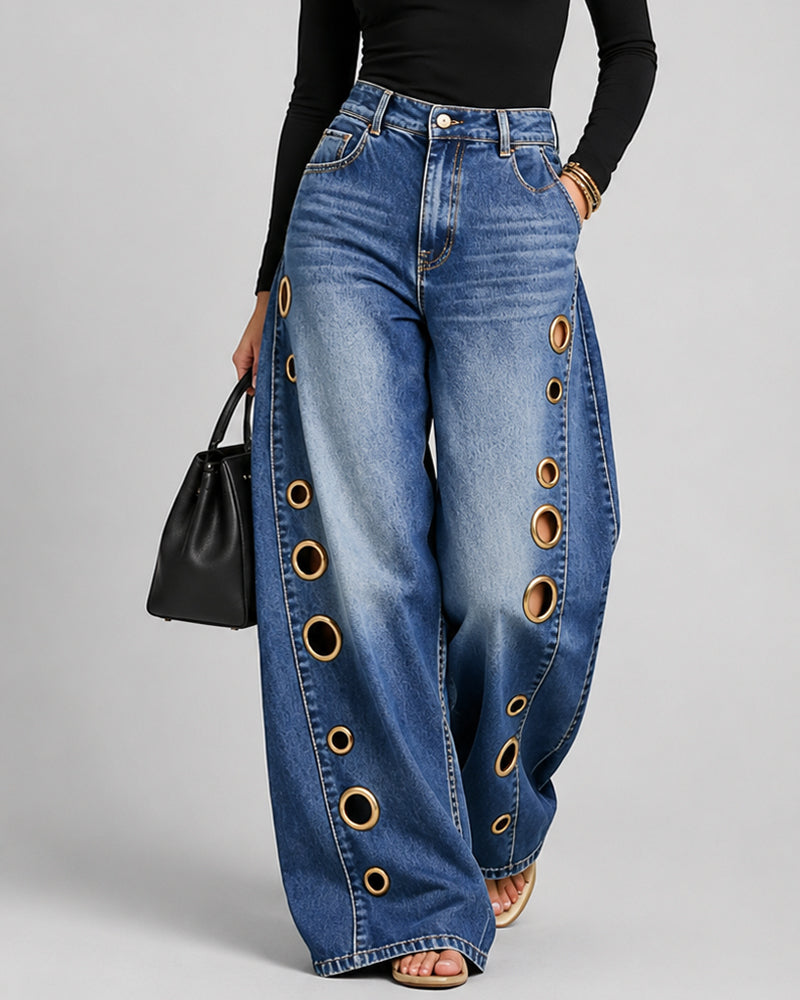 Jean large taille haute délavé à œillets métalliques