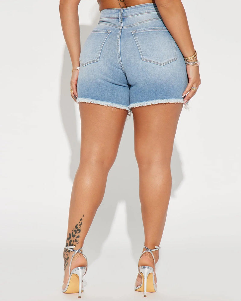 Shorts i stretchdenim med vasket, slitt effekt