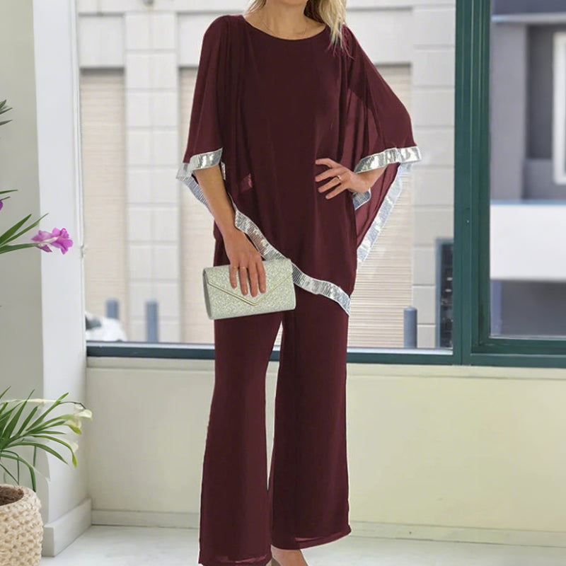 Conjunt de poncho de lladures i pantalons amples