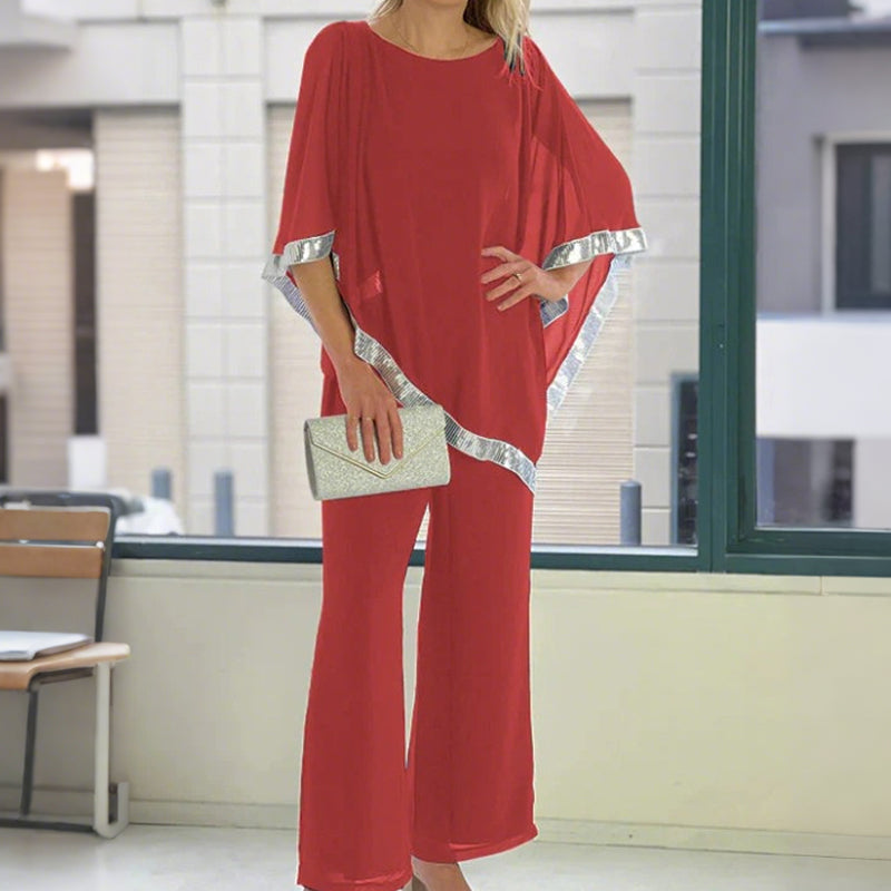 Conjunt de poncho de lladures i pantalons amples