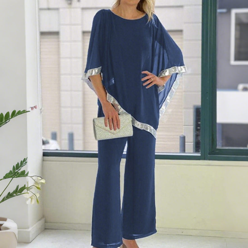 Conjunt de poncho de lladures i pantalons amples