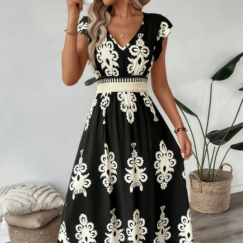 Vestit llarg i fluid de dona amb coll en V i estampat barroquet