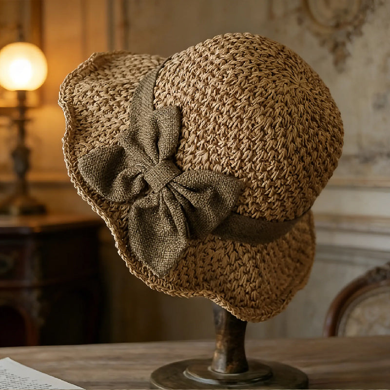 Elegante sombrero de sol de paja trenzada con un lazo