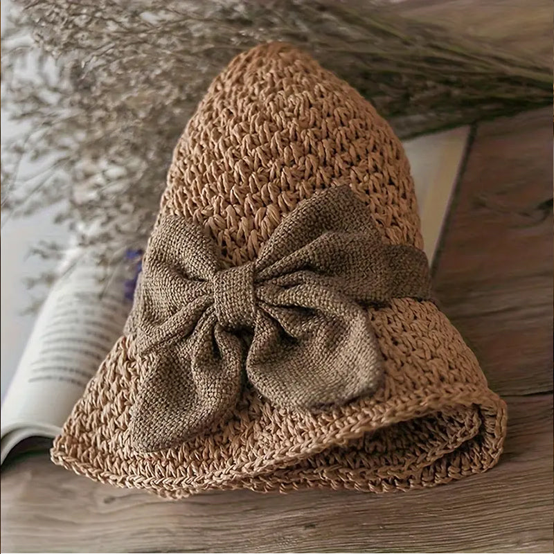 Elegante sombrero de sol de paja trenzada con un lazo
