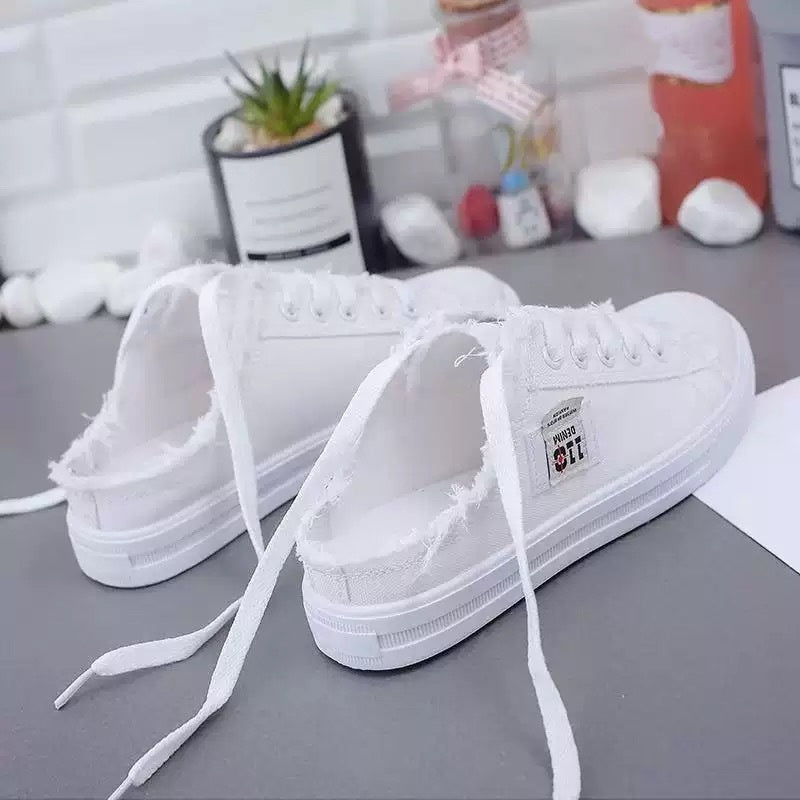 Sneakers mules in denim da donna