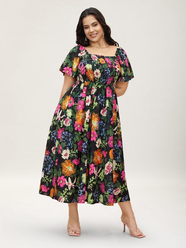 Vestit midi de flors, coll quadrat i gofrat, amb butxaques