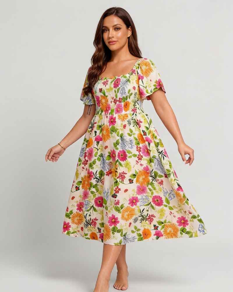 Vestit midi de flors, coll quadrat i gofrat, amb butxaques