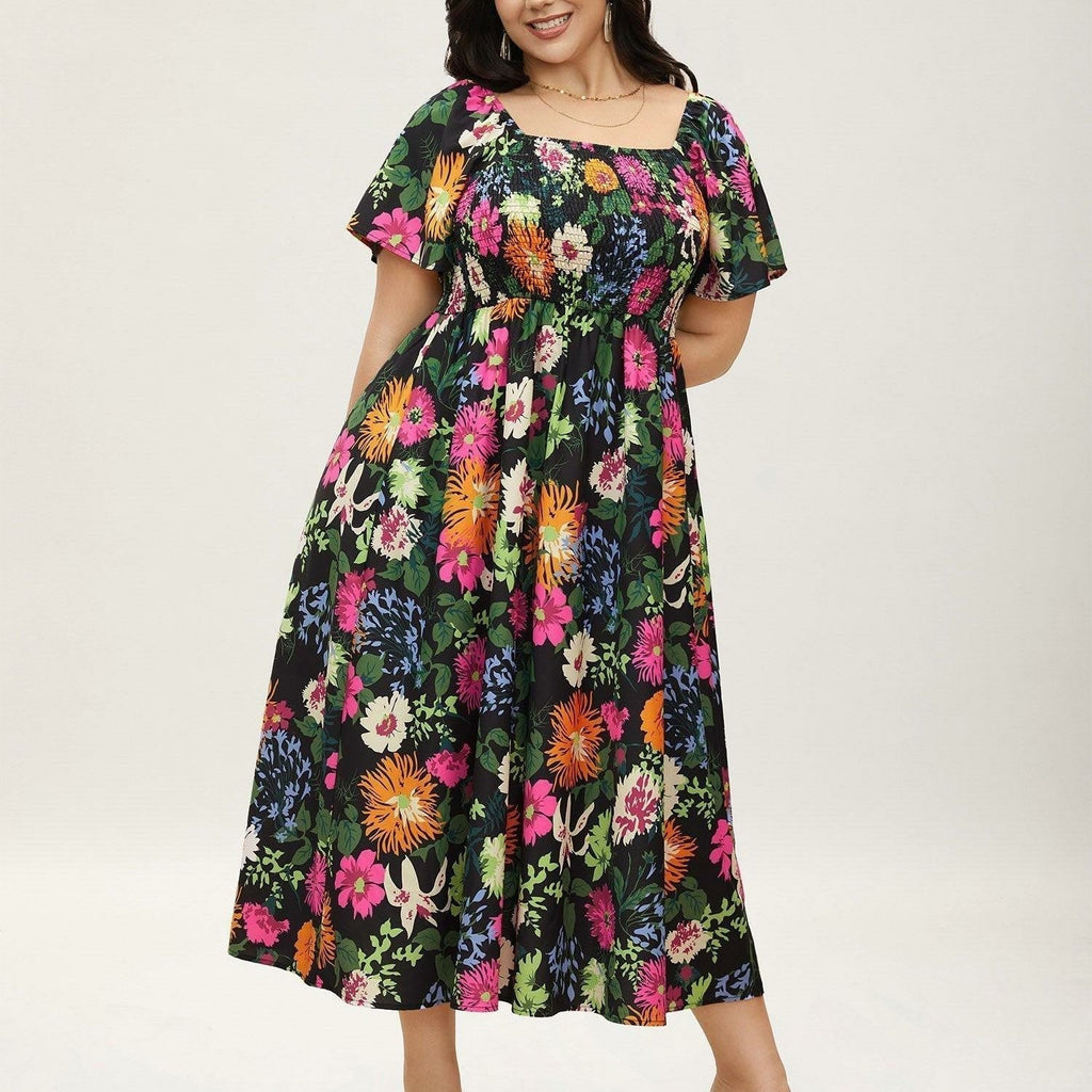 Vestit midi de flors, coll quadrat i gofrat, amb butxaques