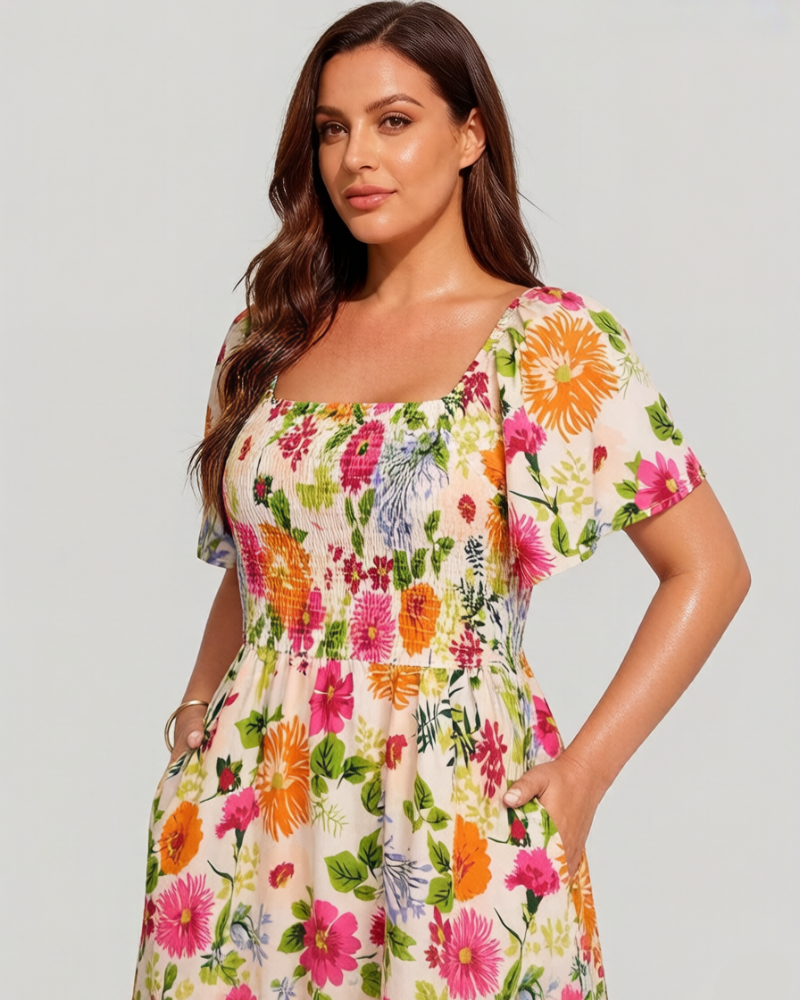 Vestit midi de flors, coll quadrat i gofrat, amb butxaques