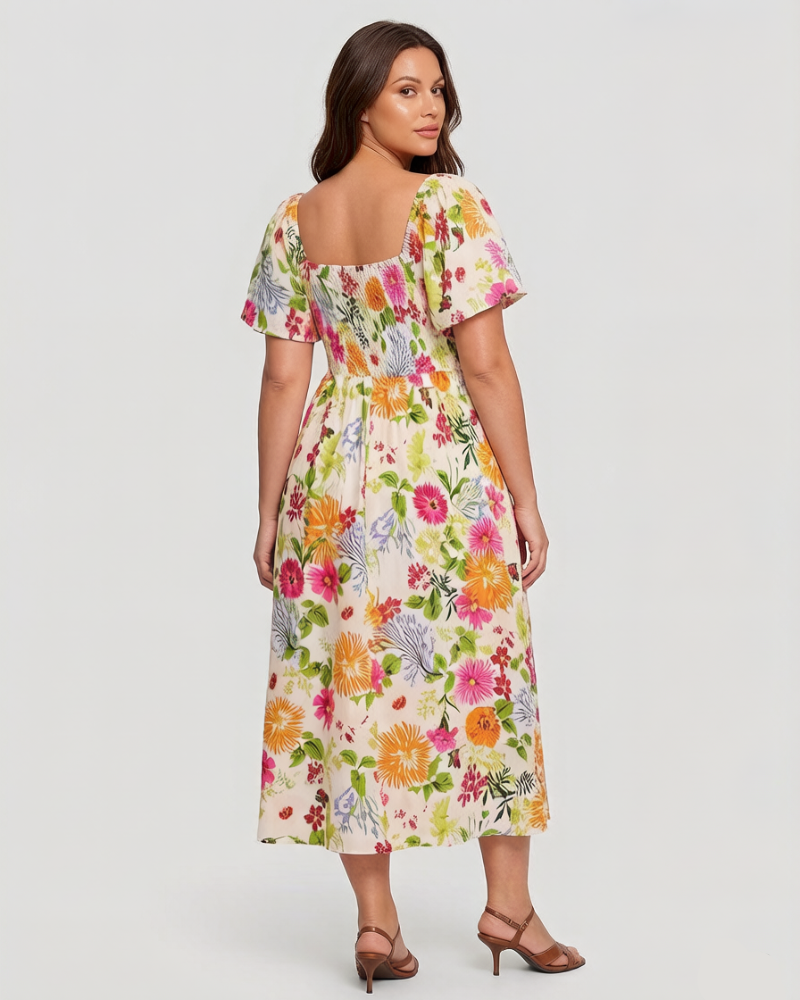 Vestit midi de flors, coll quadrat i gofrat, amb butxaques