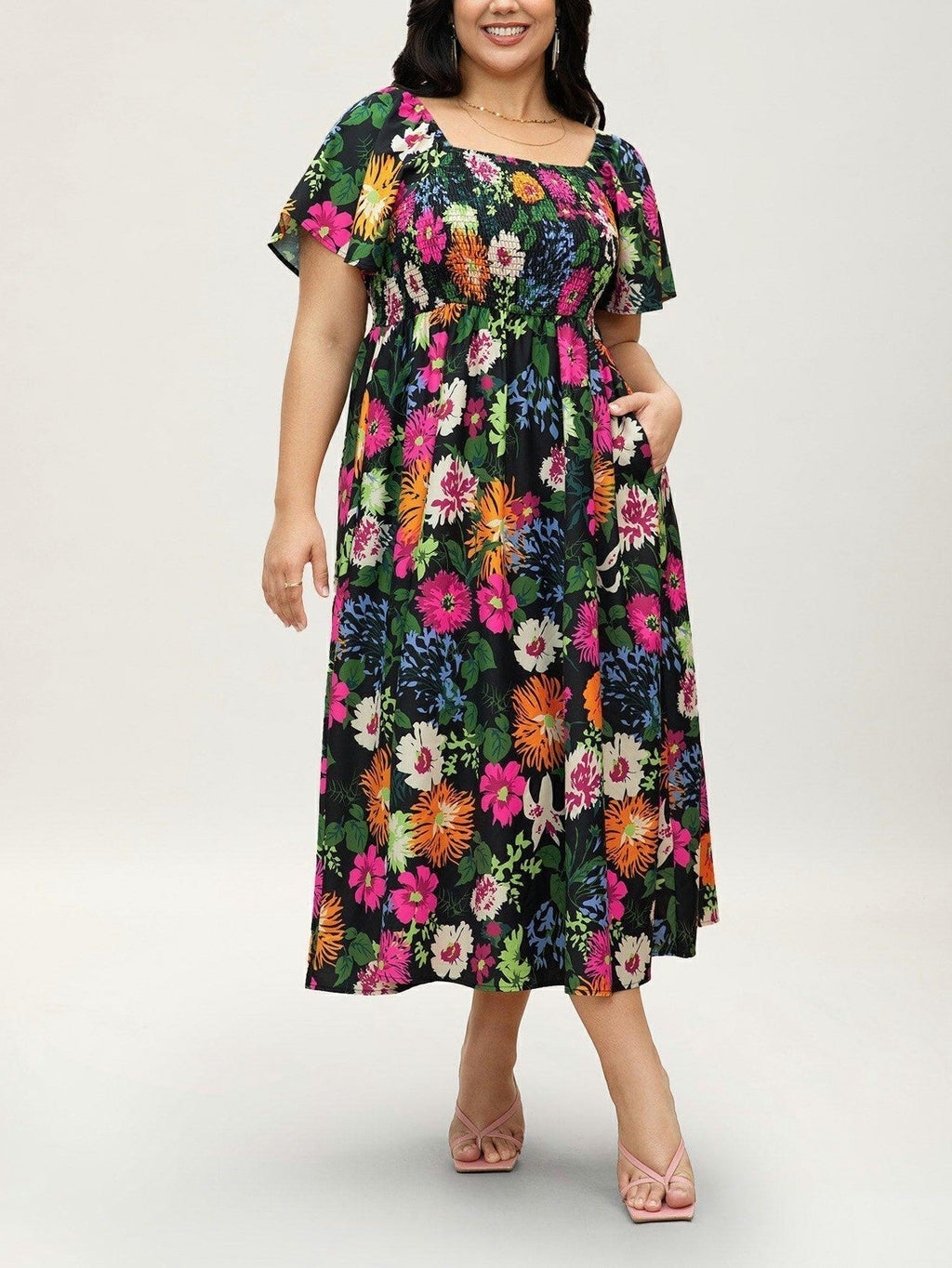 Vestit midi de flors, coll quadrat i gofrat, amb butxaques