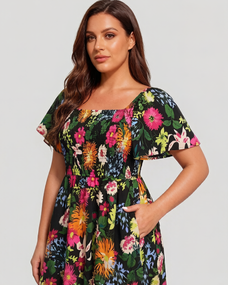 Vestit midi de flors, coll quadrat i gofrat, amb butxaques