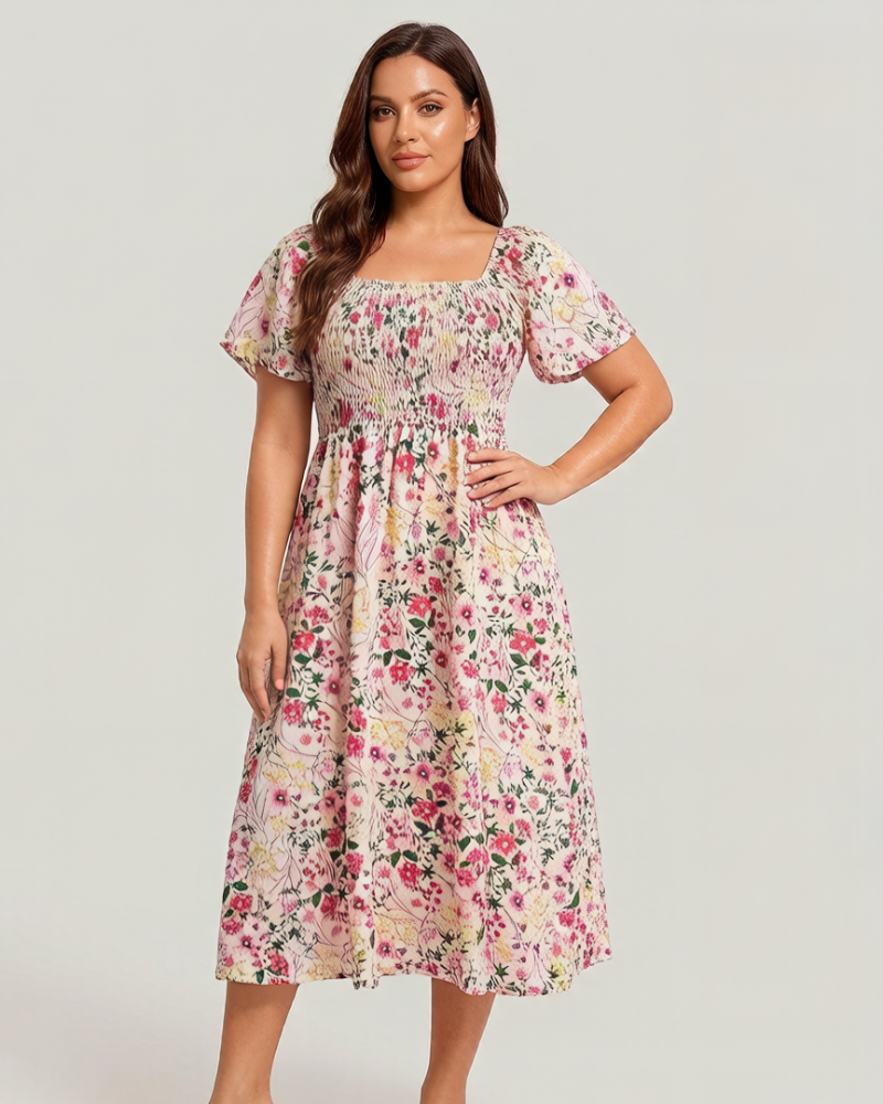 Vestit midi de flors, coll quadrat i gofrat, amb butxaques