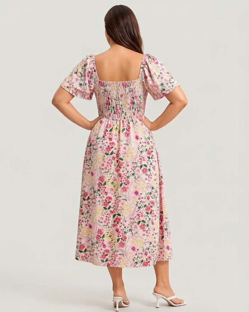 Vestit midi de flors, coll quadrat i gofrat, amb butxaques